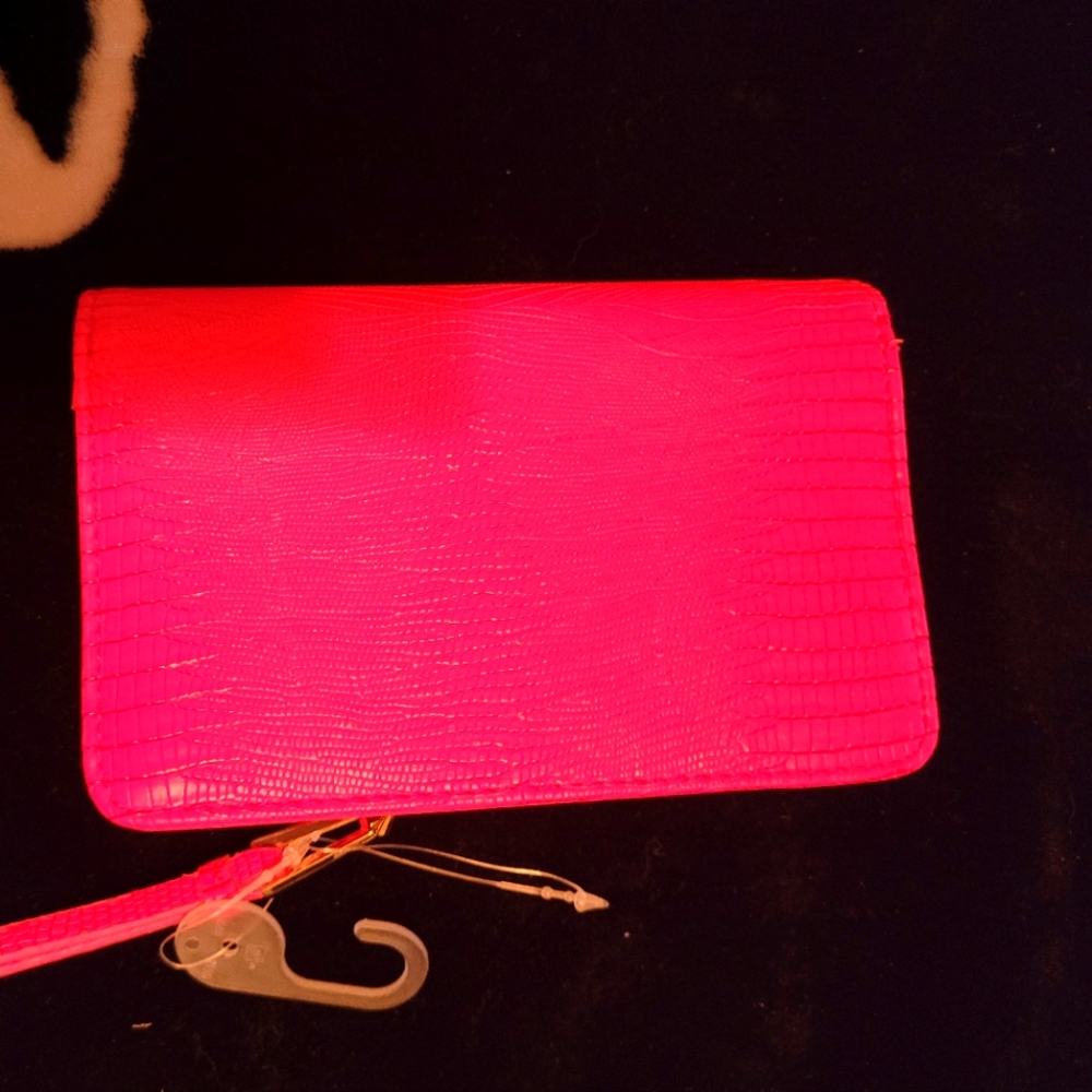 Medium-sized triple compartment wallet.